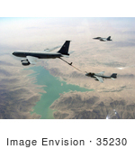 #35230 Stock Photo Of A US Navy F/A-18f Super Hornet Aircraft Flying Near A US Air Force Kc-135r Stratotanker Refueling A US Navy Ea-6b Prowler Over Helmand Afghanistan