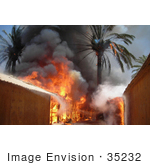 #35232 Stock Photo Of Fire Consuming Trees And Buildings Of A Marine Compound At The Entrance Of Fallujah Iraq June 25th 2008