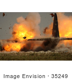 #35249 Stock Photo Of The US Air Force Detonating Explosives Attached To The Wings Of A C-130 Hercules Aircraft At Sather Air Base In Iraq