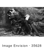 #35628 Stock Photo Of Oscar Wilde Reclined On A Sofa Holding A Book And Leaning His Head On His Hand