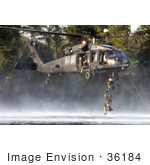 #36184 Stock Photo Of US Air Force Pararescuemen Climbing A Ladder To A US Army Mh-60 Black Hawk Helicopter