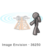 #36250 Clip Art Graphic of a Grey Guy Character Using a Cellphone by a Tower by Jester Arts
