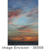 #36509 Stock Photo Of Orange And Pink Wispy Clouds Scattered At Sunset Over The Ocean Poipu Kauai Hawaii