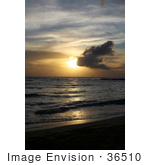 #36510 Stock Photo Of A Sailboat Far In The Distance On The Ocean At Sunset Seen From Poipu Kauai Hawaii