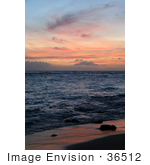 #36512 Stock Photo Of A Dusk Sky Of Pink Clouds Over The Ocean Reflecting Off Of The Wet Sand Poipu Kauai Hawaii