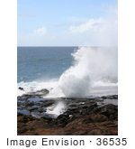 #36535 Stock Photo Of The Blowhole Spouting Horn Spurting Up Water By The Pacific Ocean Poipu Kauai Hawaii