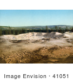 #41051 Stock Photo Of The Paint Pot And A Line Of Evergreen Trees At Yellowstone National Park Wyoming