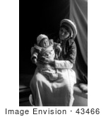 #43466 Rf Stock Photo Of A Ramallah Woman Holding Her Baby In Her Lap