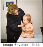 #5133 Stock Photography Of A Physician Examining A 9 Month Old Baby