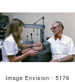 #5176 Picture Of A Nurse Checking A Male Patient'S Blood Pressure
