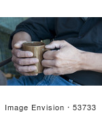 #53733 Royalty-Free Stock Photo Of A Man Holding A Hot Drink In A Mug