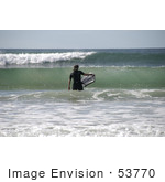 #53770 Royalty-Free Stock Photo Of A Surfer In The Waves