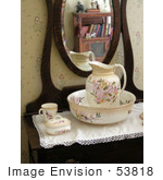#53818 Royalty-Free Stock Photo Of A Vintage Water Pitcher By A Mirror