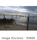 #53828 Royalty-Free Stock Photo Of A Pier And Pelican On A Beach