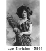 #5844 Woman In Serape Holding Wheat