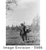 #5986 Cree Woman Carrying Moss