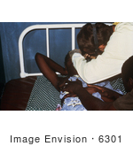 #6301 Picture of a Doctor Getting a Eye Scraping from a Lassa Fever Patient by KAPD