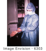 #6303 Picture Of A Doctor Putting On Marburg Fever Protective Gear
