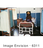 #6311 Picture of a Female Patient Recovering from Lassa Fever in the Segbwema, Sierra Leone Clinic by KAPD