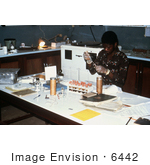 #6442 Picture of a Person Separating Blood Sera at the Segbwema, Sierra Leone Lassa Fever Laboratory In 1977 by KAPD