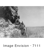 #7111 Stock Photography: Three Crow Indians On Rock Ledge