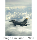 #7365 Stock Image Of An F-16 Fighting Falcon Above The Clouds