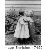 #7455 Stock Image of a Little Boy and Girl Kissing by JVPD