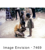 #7469 Picture Of A Nigerian Children Being Weighed On A Scale