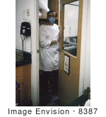 #8387 Picture Of Virologist Entering A Biosafety Level-4 Laboratory - 1975