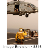 #8846 Picture Of A Person Directing A Seahawk Helicopter