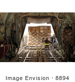 #8894 Picture Of A Soldier Loading A C-130 Aircraft