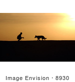 #8930 Picture Of A Man And Dog At Sunset