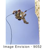#9052 Picture Of A Soldier On A Rock Wall