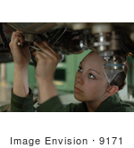 #9171 Picture Of A Female Soldier Working On A Jet Engine