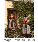#9379 Picture Of People By A Spinning Wheel