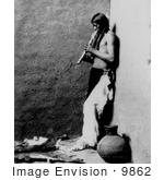 #9862 Picture Of An American Indian Playing An Instrument