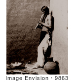 #9863 Picture Of An American Indian Playing An Instrument