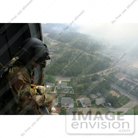 #10589 Picture of a Soldier Overlooking a City From a Helicopter by JVPD