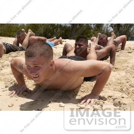 #10779 Picture of Marine Soldiers Doing Doing Squad Push-ups in Sand by JVPD