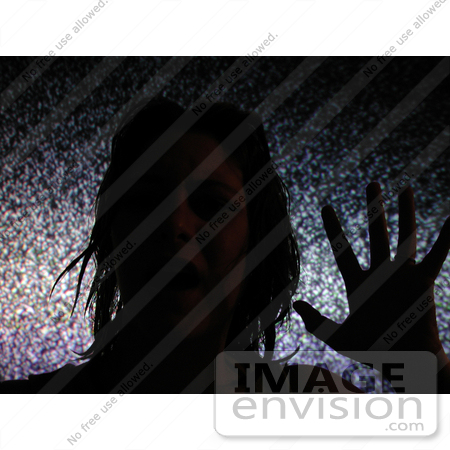 #140 Stock Photo of a Ghostly Woman Stuck in a TV by Jamie Voetsch