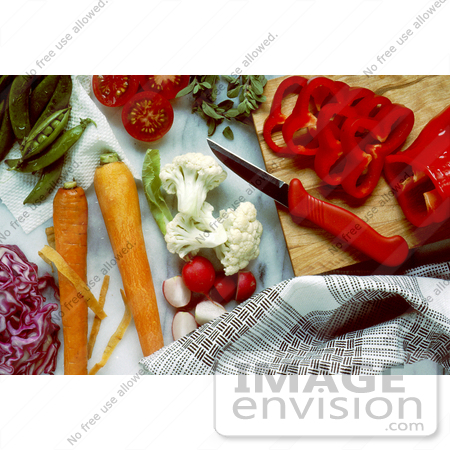 #17104 Picture of Red Paring Knife Near Pea Pods, Purple Cabbage, Cherry Tomatoes, Watercress, Carrots, Cauliflower, Radishes, dnd Red Bell Peppers by JVPD