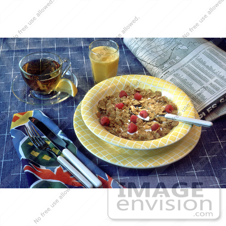 #17111 Picture of Cold Breakfast Cereal, Newspaper, Orange Juice, Tea and Silverware by JVPD