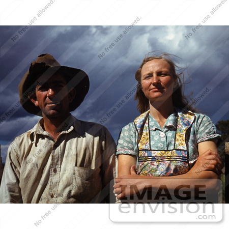 #17872 Photo of a Farmer Husband and Wife Against a Stormy Sky by JVPD