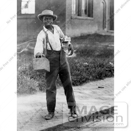#20514 Historic Stock Photography of a Friendly African American Boy Offering His Shoeshining Services by JVPD