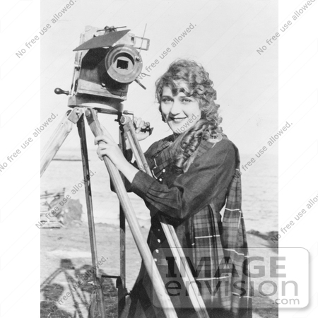 #21330 Stock Photography of Gladys Louise Smith, Known as Mary Pickford, Standing With a Motion Picture Camera by JVPD