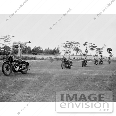 #21692 Stock Photography of Women Performing Stunts on Motorcycles by JVPD