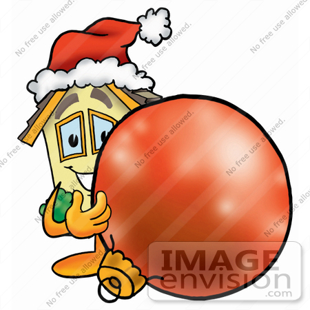 #24224 Clip Art Graphic of a Yellow Residential House Cartoon Character Wearing a Santa Hat, Standing With a Christmas Bauble by toons4biz