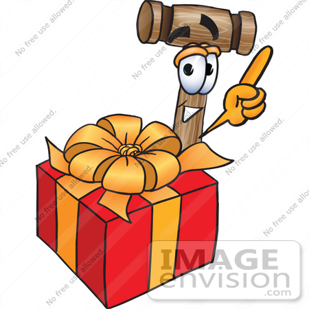#24863 Clip Art Graphic of a Wooden Mallet Cartoon Character Standing by a Christmas Present by toons4biz