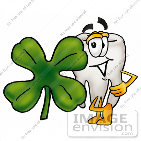 #25334 Clip Art Graphic of a Human Molar Tooth Character With a Green Four Leaf Clover on St Paddy’s or St Patricks Day by toons4biz