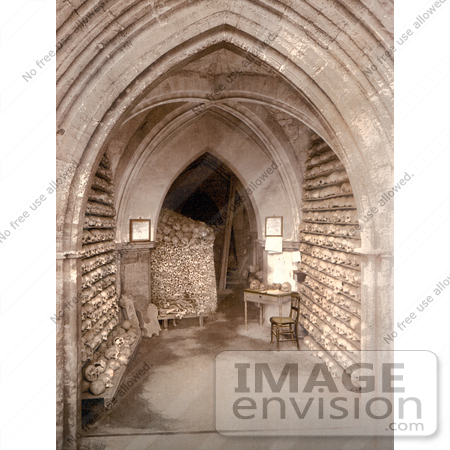 #26777 Stock Photography of Human Skulls and Skeletal Remains Stacked in the Ossuary Bone Store of the Church Crypt in Hythe Kent England by JVPD